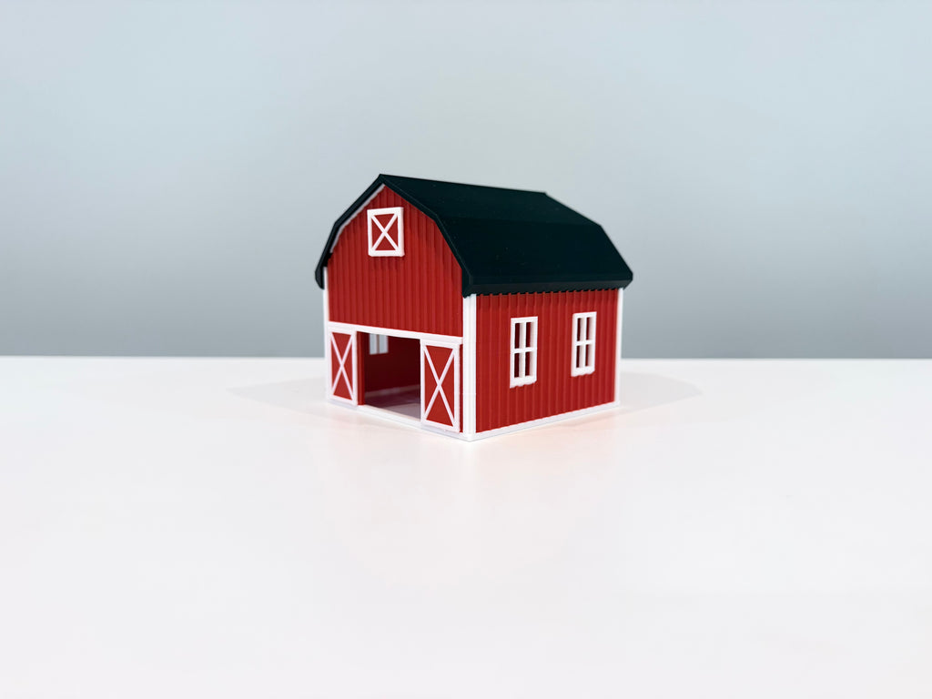 Opposite angled view of the red Barn miniature showing the side windows and doorway.