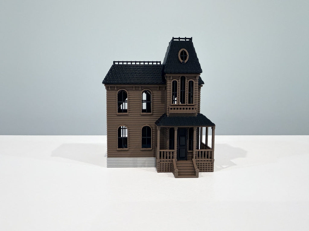 Spooky house front with porch and dark roof